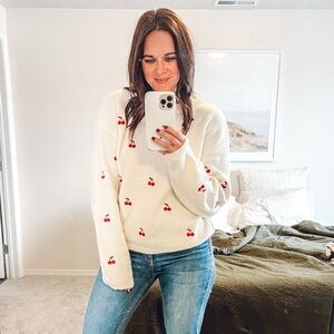 a new day White Sweater with Red Accents